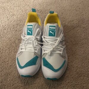 Puma White Sneakers with Teal Accents and Yellow Lining